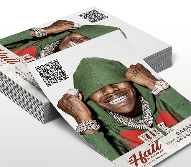 Stack of concert club flyers with QR code