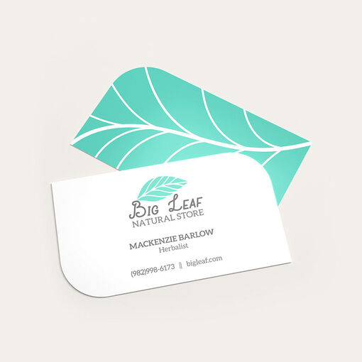 White and teal leaf-shaped cards for a natural store